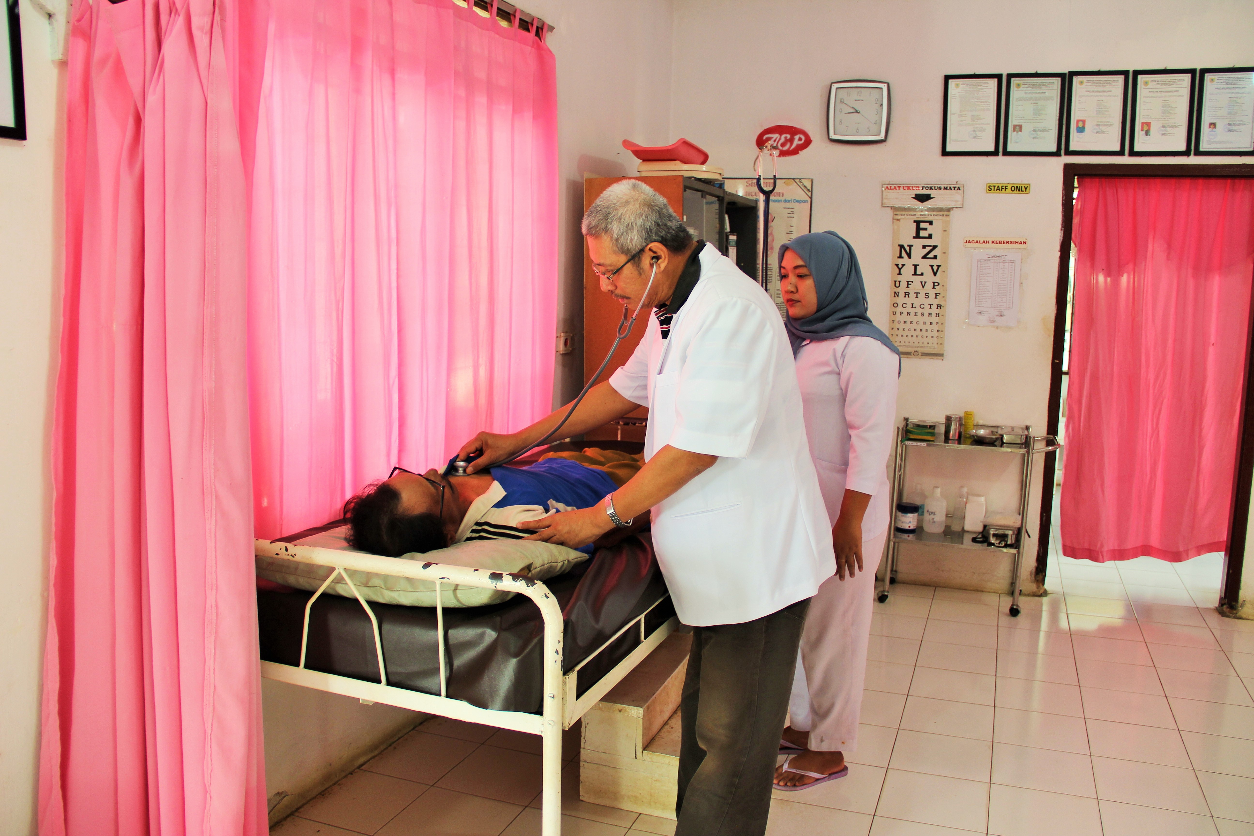 An Estate Doctor Tending to a Staff Patient